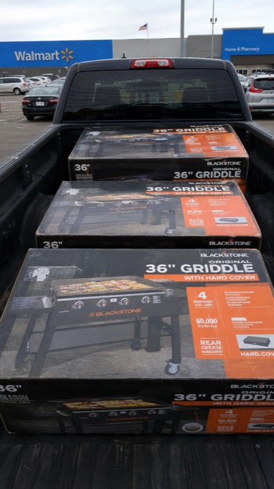 Blackstone 36 inch griddle boxes in a truck bed, Walmart clearance haul